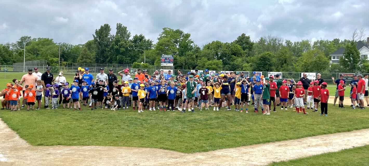 Cohoes Little League players and coaches gathered on the field on Opening Day